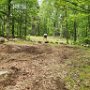 May 2025 - Flint Road: What you see when standing at the top of the knoll at entrance of the parking lot looking to the back of the parking area.