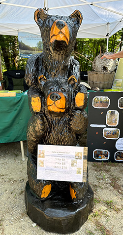 Carved bear raffled at Candia Old Home Day